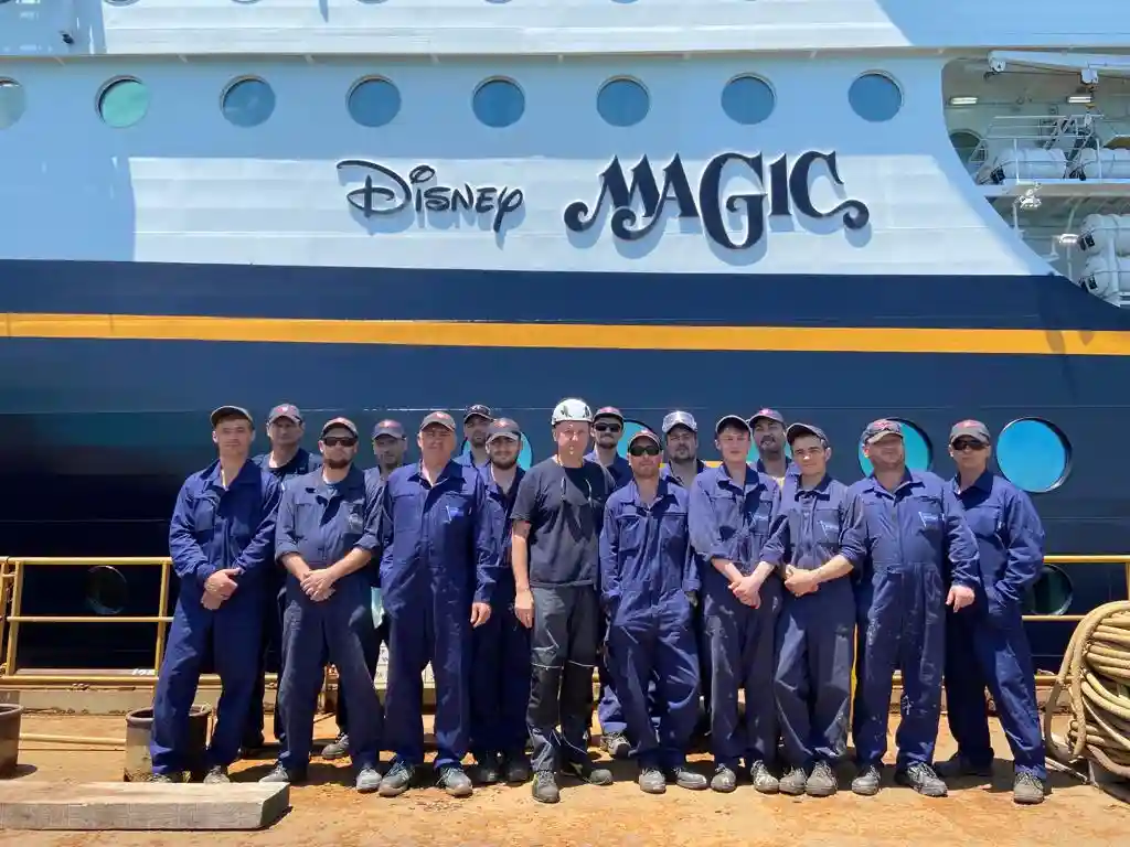 Decimus Precision riding team in front of Disney Magic