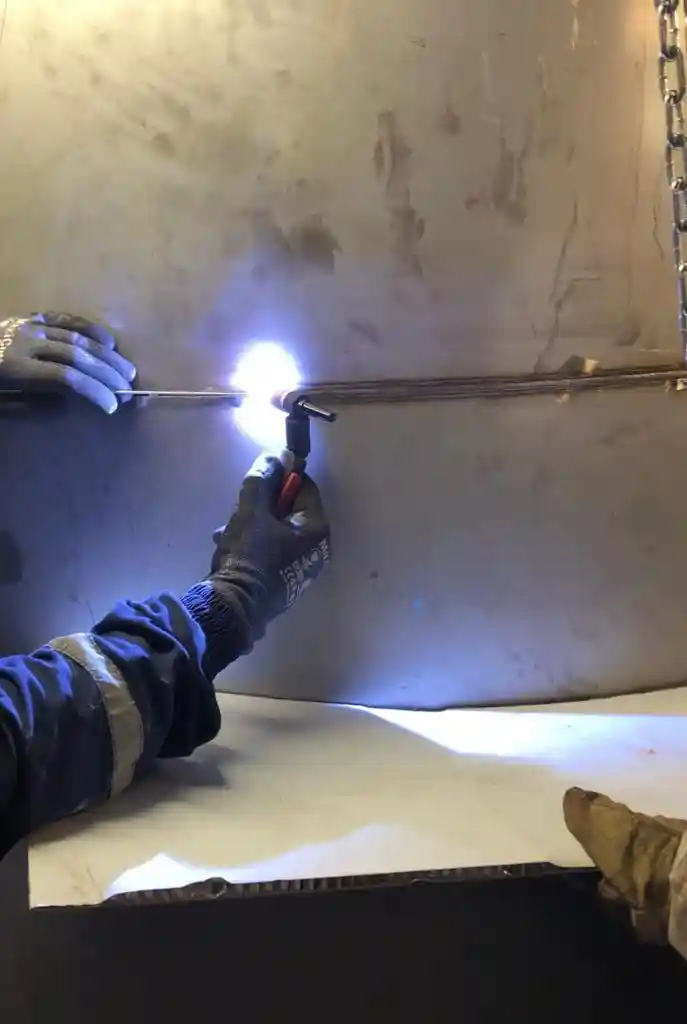 Close-up of TIG welding on a metal hull